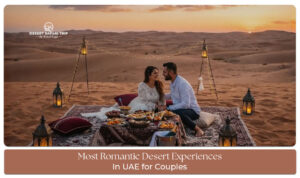 Couple enjoying desert sunset UAE dunes