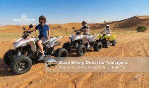 Teenagers enjoying an adventurous quad biking ride across the sandy dunes of Dubai.
